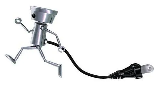 A metallic robot runs while pulling a black electrical cord.