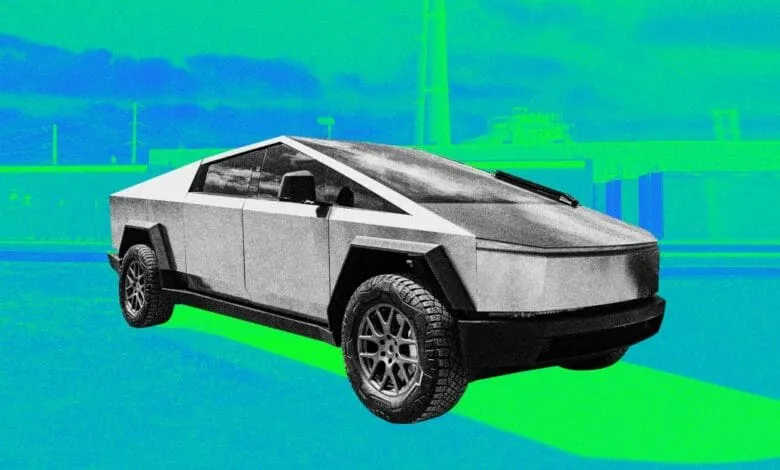 A grayscale Tesla Cybertruck hovers above a bright green and blue ground, set against a similarly colored industrial backdrop.