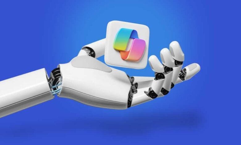 A robotic hand gently holds a colorful app icon against a vibrant blue background, showcasing AI and technology.