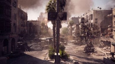 A war-torn city street scene; rubble, destroyed vehicles, and smoke fill the area. A billboard displays a woman's portrait.