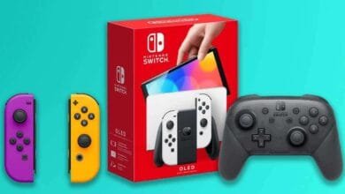 Nintendo Switch OLED model with purple and yellow Joy-Con controllers and a third-party controller.