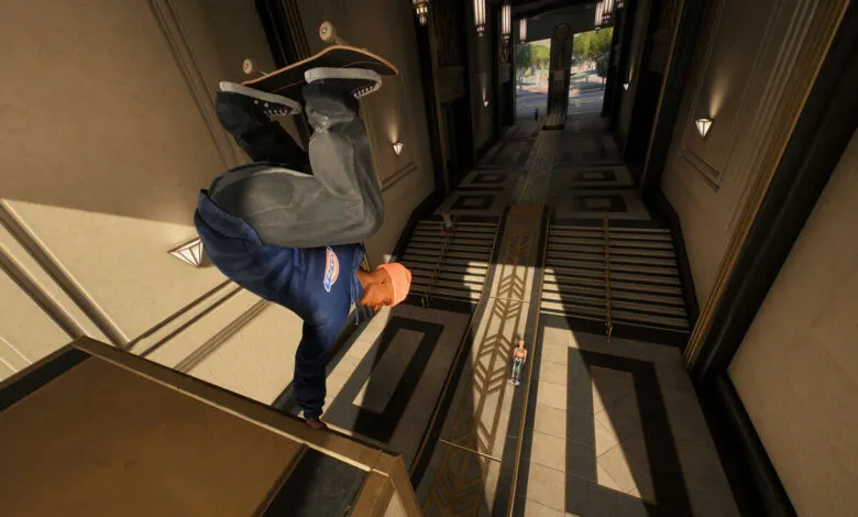 Skateboarder performing a trick in a grand building's hallway.