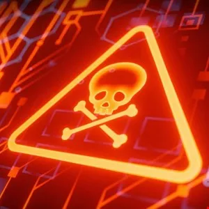 Glowing orange skull and crossbones warning sign on a digital circuit board background.