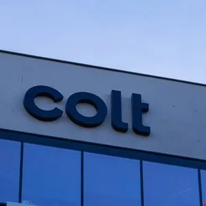 Colt Technology Services logo on a building exterior.