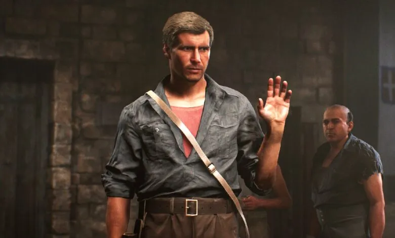 A man in a gray shirt and brown pants raises his hand, appearing to surrender or signal for help in a dimly lit stone room.