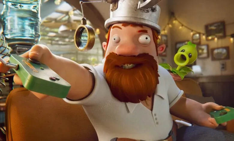 A cartoon man with a red beard operates a steampunk-style device, a small plant beside him.