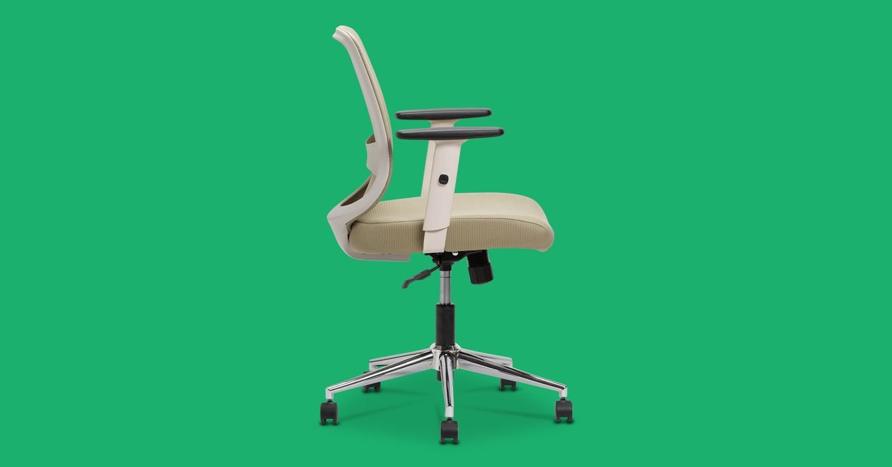 Beige ergonomic office chair with mesh back and adjustable height, shown in profile against a green background.