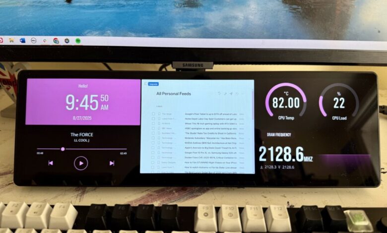 Dual-screen display showing time, music, news headlines, and system stats. One screen shows a clock, music player, and the other shows news feeds and CPU information.