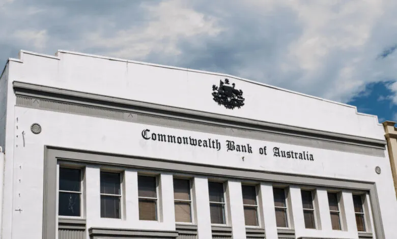 Historic Commonwealth Bank building in Newtown, Sydney, featuring the Australian coat of arms.