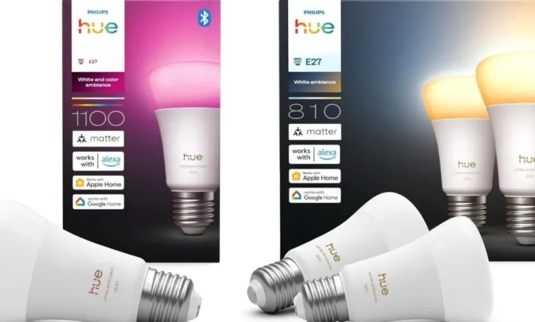 Two Philips Hue smart light bulb packages, one for color ambiance and one for white ambiance.