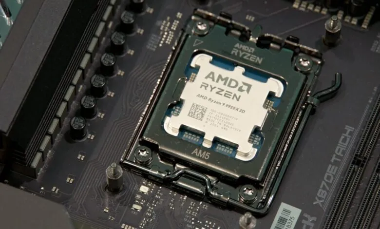 Close-up of an AMD Ryzen 9 9950X3D processor installed on a dark motherboard.