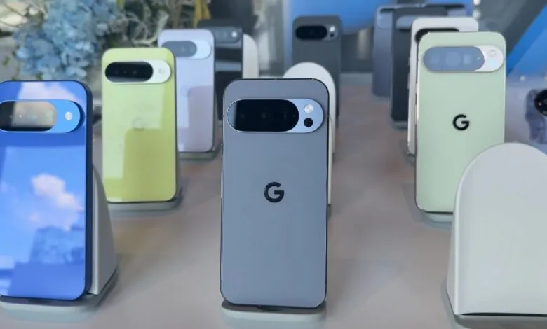 Google Pixel phones in various colors displayed on stands.