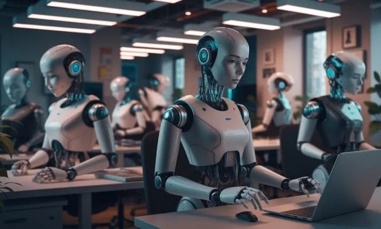 Humanoid robots work at computers in a modern office setting.