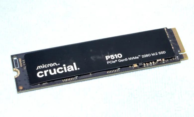 Close-up of a Crucial P510 PCIe Gen5 NVMe 2280 M.2 SSD, a black solid-state drive with white labeling.