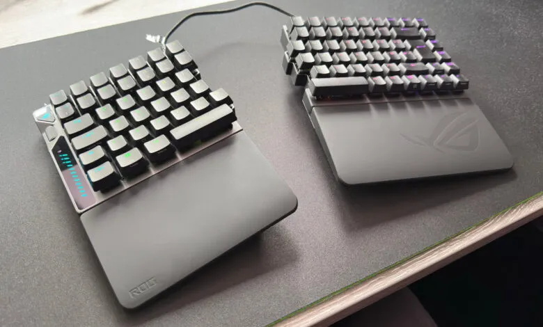 Two split ergonomic keyboards on a desk, one silver and one black, with RGB lighting.