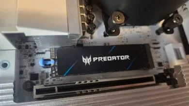 Close-up of a Predator PCIe SSD installed in a computer motherboard.