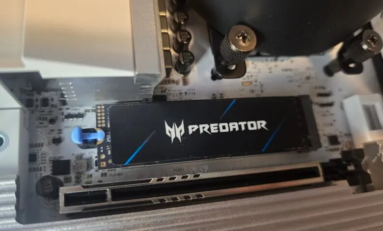 Close-up of a Predator PCIe SSD installed in a computer motherboard.