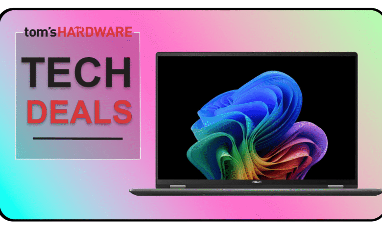 Laptop showcasing Windows 11's colorful abstract wallpaper, featured in a Tom's Hardware 'Tech Deals' advertisement.