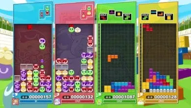 Four-player screen of Puyo Puyo Tetris 2, showing colorful blocks and cute characters in simultaneous gameplay.