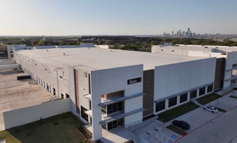 Aerial view of Aalo's Austin, TX facility, a large modern warehouse with loading docks and parking lot.