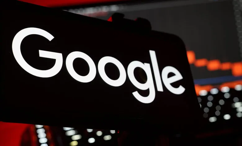 Google logo displayed brightly in white on a dark screen, with a blurred red stock chart in the background.