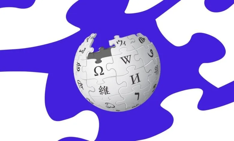 Wikipedia globe puzzle: A white globe jigsaw puzzle with letters from various languages against a blue and white background.