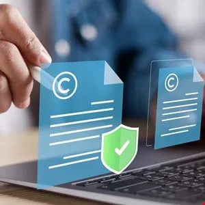 Person digitally signing documents with copyright symbols and a security shield, signifying secure digital document signing.