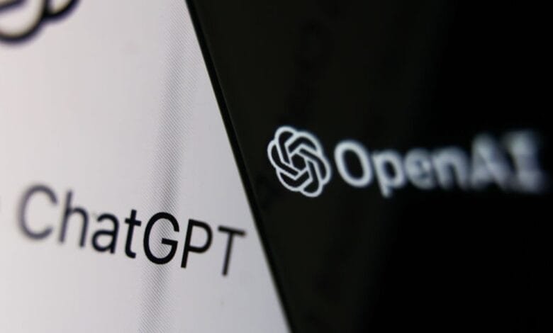 Close-up of a screen displaying the ChatGPT text and the OpenAI logo.