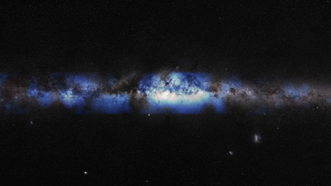 Stunning view of the Milky Way galaxy, showcasing its swirling dust and gas clouds in shades of blue and gray against a dark, star-studded background.