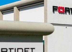 Fortinet building exterior with company logo prominently displayed.