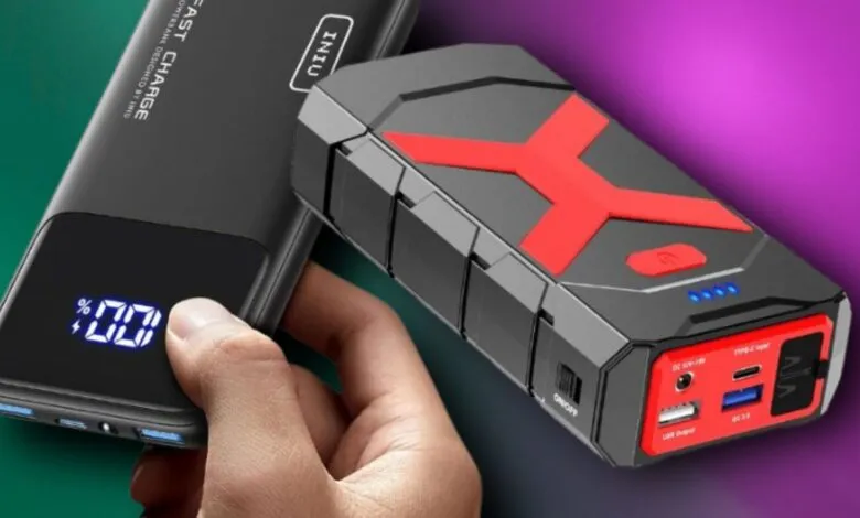 Two portable power banks: a black power bank with a digital display and a rugged red and black jump starter.