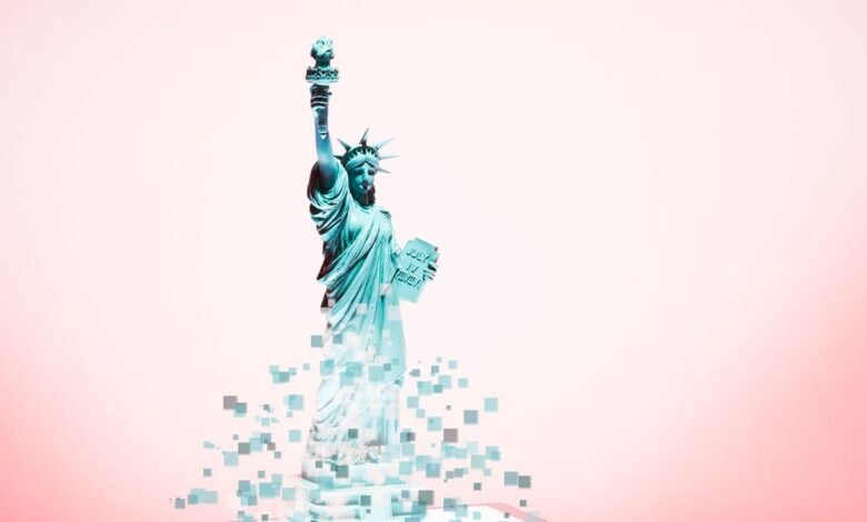 Statue of Liberty digitally dissolving into pixels against a pink background.