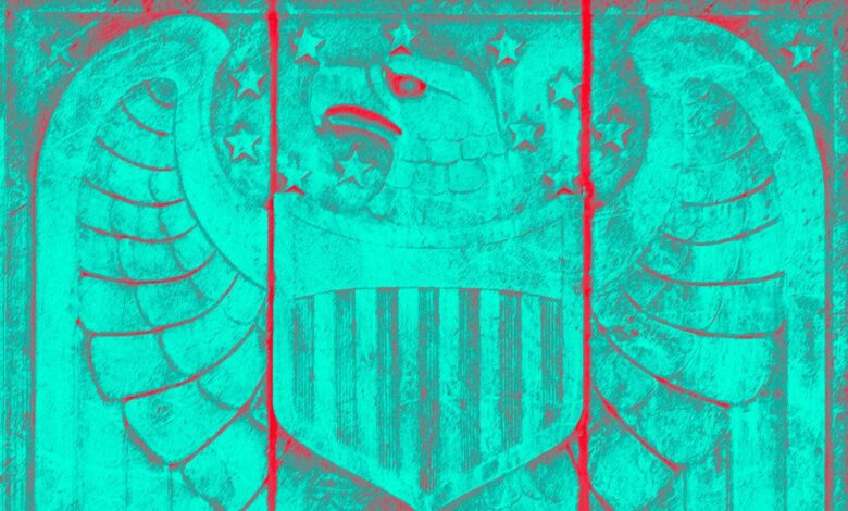 Stylized teal and red carving of an eagle emblem with stars and stripes.