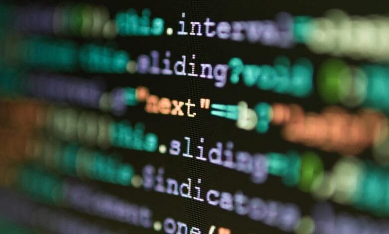 Close-up of colorful code on a computer screen, showcasing lines of programming text with a shallow depth of field.