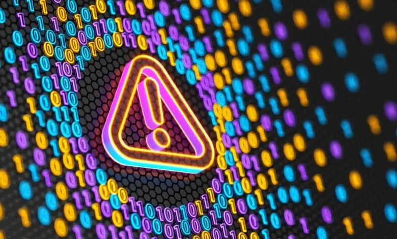 Neon warning sign with exclamation mark on a background of binary code, representing a digital alert or system error.