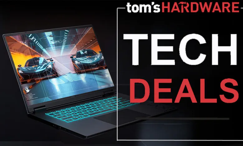 Gaming laptop displaying a racing game, featured in a Tom's Hardware tech deals advertisement.