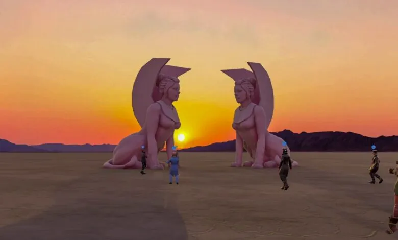 Two large pink sphinx statues face each other against a desert sunset.