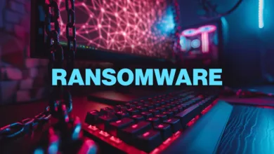 Ransomware attack depicted: a computer keyboard and monitor are bound by chains, with the word 'Ransomware' overlaid.
