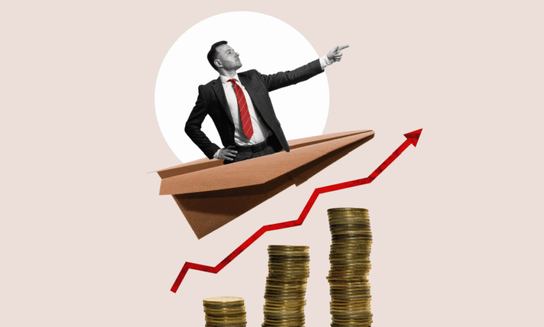 Businessman on paper airplane soaring above stacks of coins, symbolizing financial growth and success.