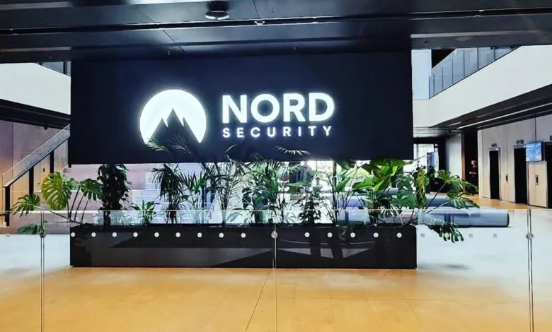 Nord Security logo displayed prominently in a modern lobby with plants.
