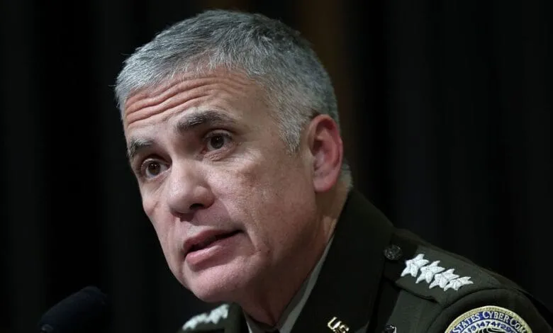Close-up of General Paul Nakasone, Commander of US Cyber Command, speaking at a press conference.