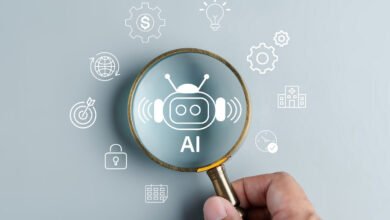 AI robot icon magnified, surrounded by business and technology icons. Illustrates AI's impact on various sectors.