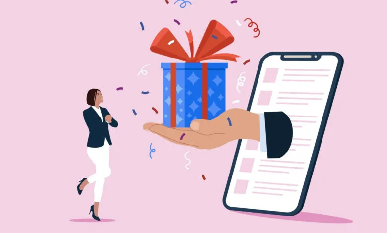 Excited businesswoman receives a gift from a smartphone; confetti surrounds them.