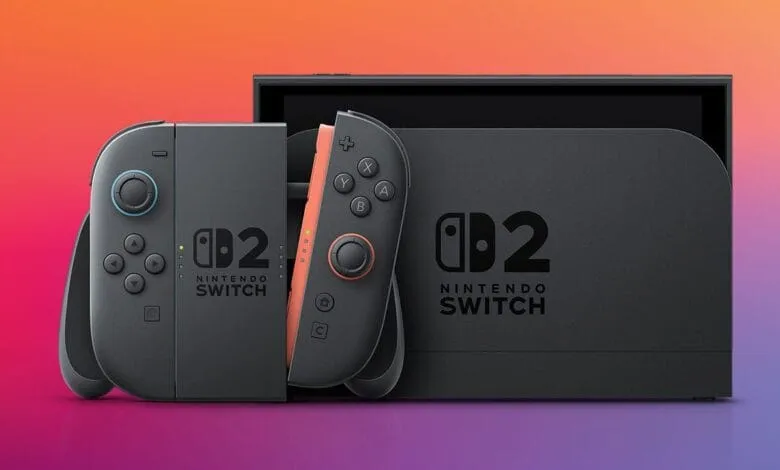 Nintendo Switch OLED model with gray and coral Joy-Cons, shown in its dock.