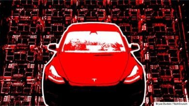 Stylized red Tesla car superimposed on a background of red and black circuit boards.