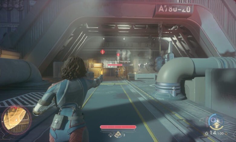 Player aims a weapon down a futuristic, industrial corridor in a video game.