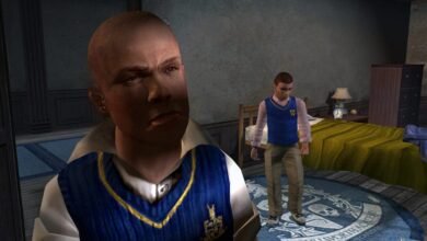 Close-up of a young boy's face with a stern expression, wearing a blue and gold school uniform vest.