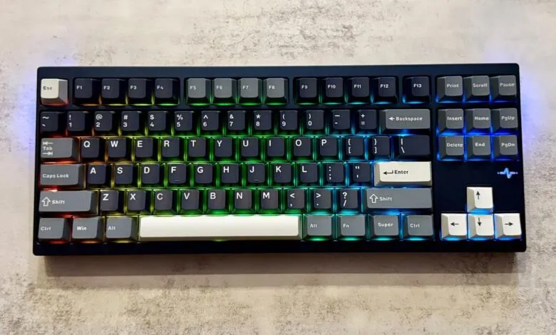 Custom mechanical keyboard with RGB backlighting, showcasing a unique keycap arrangement and color scheme.