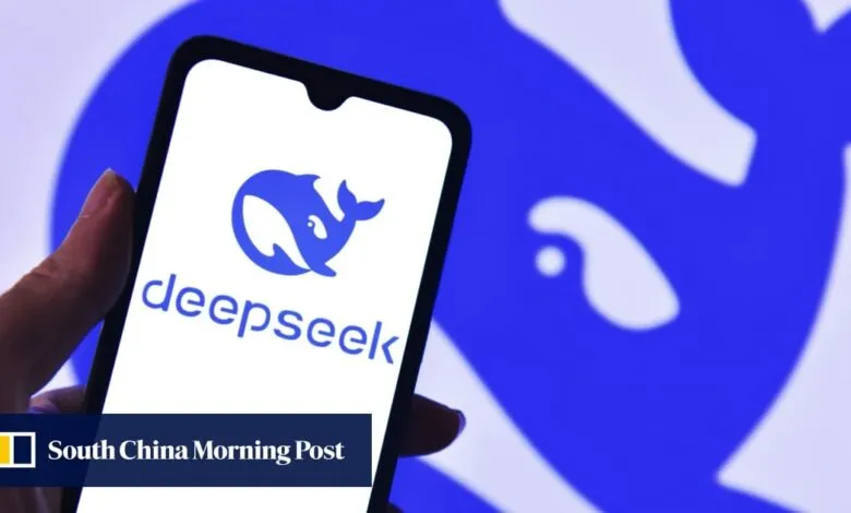 Close-up of a smartphone displaying the DeepSeek app logo, a stylized blue whale.