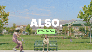 Woman sits on a park bench, a child skates by; 'ALSO. RIDEALSO.COM' overlayed.